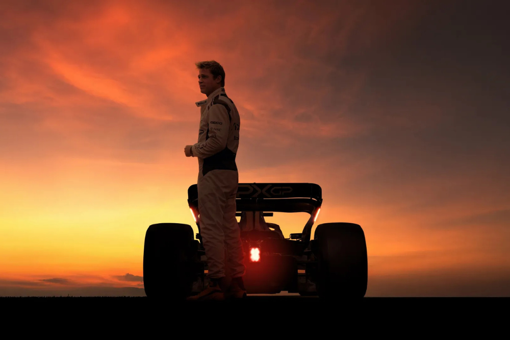 F1 movie dramatic sunset silhouette showcasing speed and precision across networks